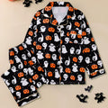 Bewitching and Bone-Chilling: Spooky Snuggle Suit for Ghoulish Ladies - Pumpkin & Skull Pajama Party Set!