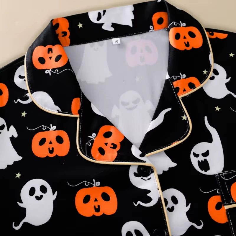 Bewitching and Bone-Chilling: Spooky Snuggle Suit for Ghoulish Ladies - Pumpkin & Skull Pajama Party Set!